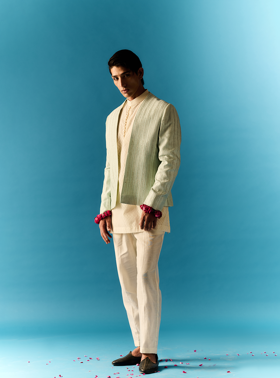 IVORY CHANDERI CHEVRON DOTTED JACQUARD KURTA AND CHANDERI PANT PAIRED WITH MINT ZARI EMBROIDERED JACKET My Store