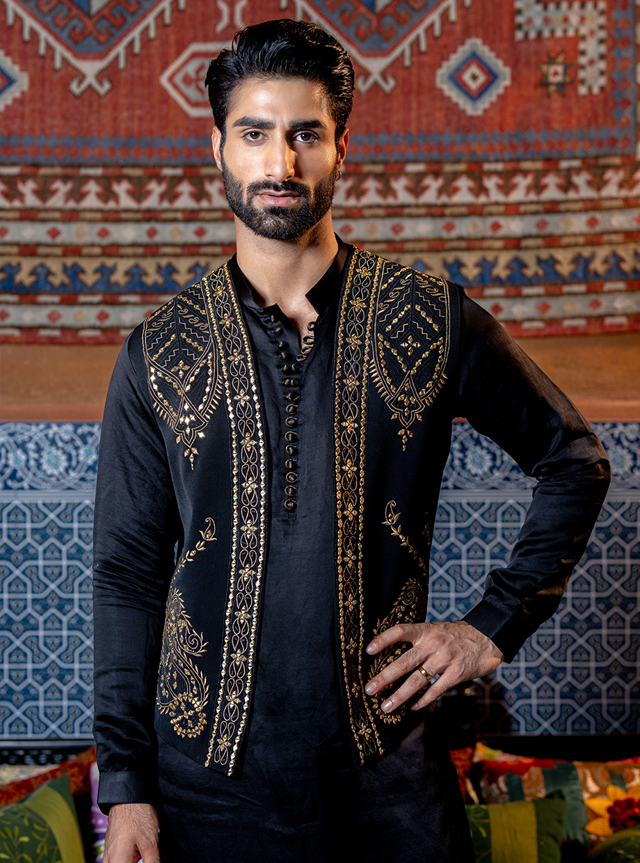 RAVEN BLACK TUSSAR SILK PATHANI SET PAIRED WITH LACHKA KOTI EXAGGERATED WITH KASAB GOLD MIRROR WORK Nafsstore