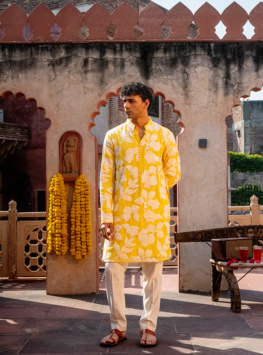 YOKE YELLOW CHANDERI KURTA WITH EGG WHITE FLORAL APPLIQUE WORK PAIRED WITH IVORY CHANDERI PANT Nafsstore