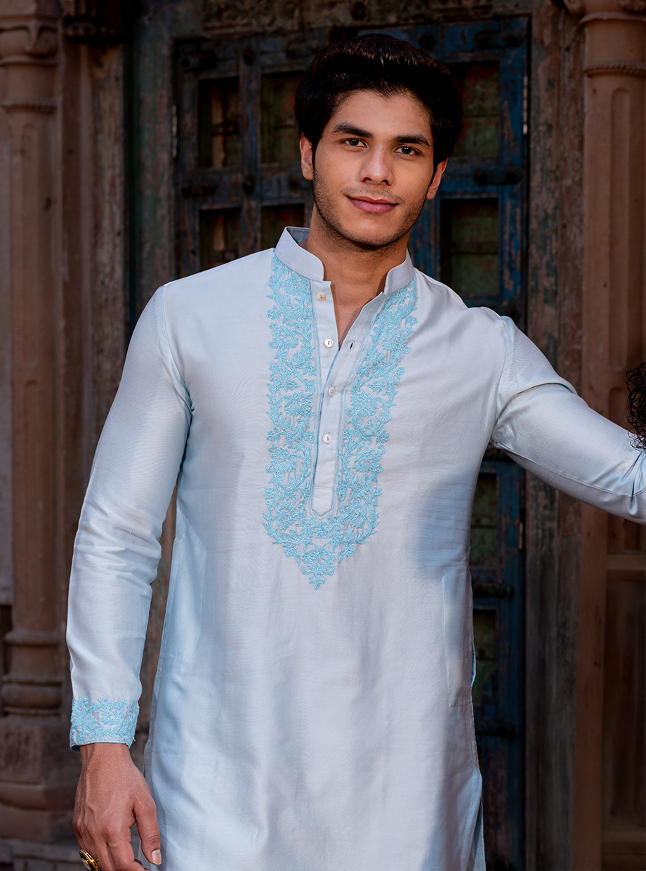 ICE BLUE CHANDERI KURTA ELABORATED WITH DORI WORK PARIED WITH IVORY TUSSAR SILK SALWAR Nafsstore