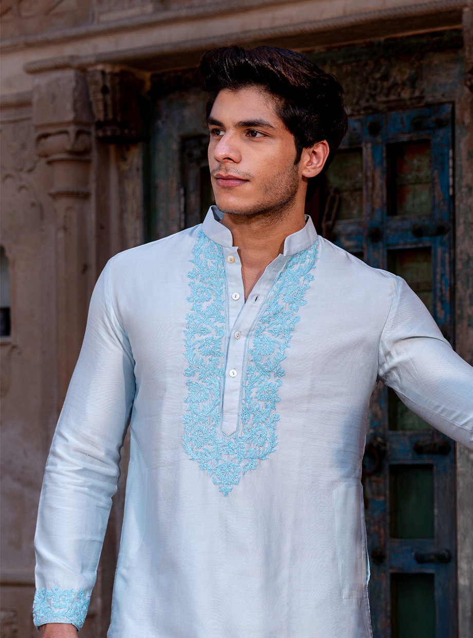 ICE BLUE CHANDERI KURTA ELABORATED WITH DORI WORK PARIED WITH IVORY TUSSAR SILK SALWAR Nafsstore