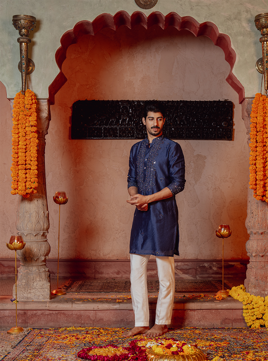 INDIGO BLUE KURTA EXAGGERATED WITH RESHAM, KASAB, DORI & MIRROR WORK PAIRED WITH IVORY CHANDERI PANT Nafsstore