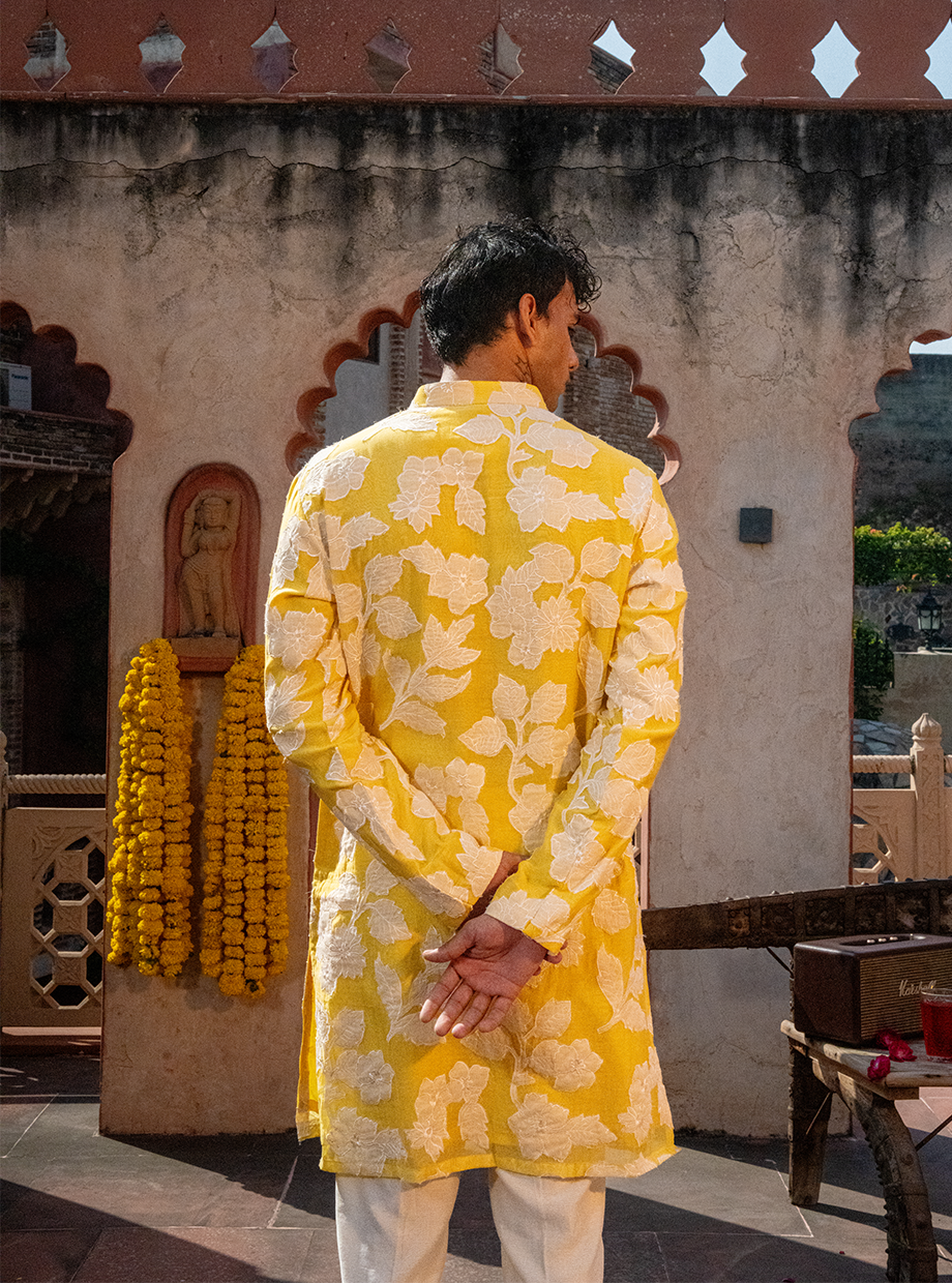 YOKE YELLOW CHANDERI KURTA WITH EGG WHITE FLORAL APPLIQUE WORK PAIRED WITH IVORY CHANDERI PANT Nafsstore