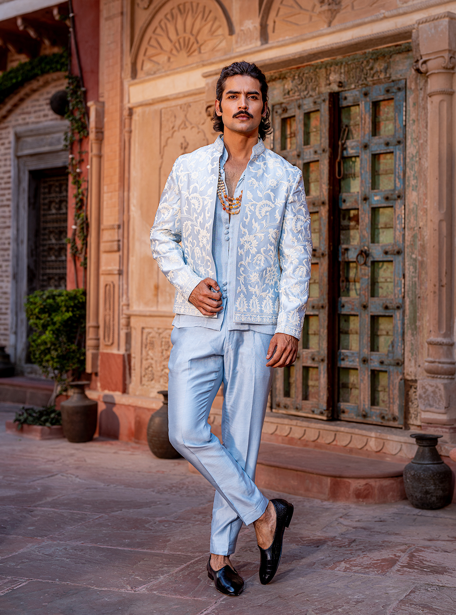 POWDER BLUE SHIMMER SHIRT + CHANDERI PANT PAIRED WITH CHANDERI JACKET EXAGGERATED WITH RESHAM AND KASAB DORI WORK Nafsstore