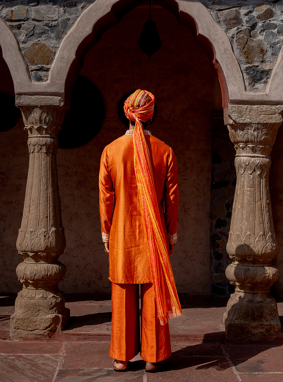 RUST CHANDERI KURTA SET ELABORATED WITH KASAB & RESHAM DORI EMBROIDERY PAIRED WITH FLARED RUST TUSSAR SILK PANT Nafsstore