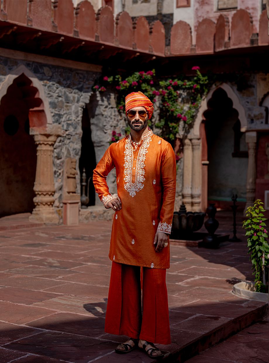 RUST CHANDERI KURTA SET ELABORATED WITH KASAB & RESHAM DORI EMBROIDERY PAIRED WITH FLARED RUST TUSSAR SILK PANT Nafsstore