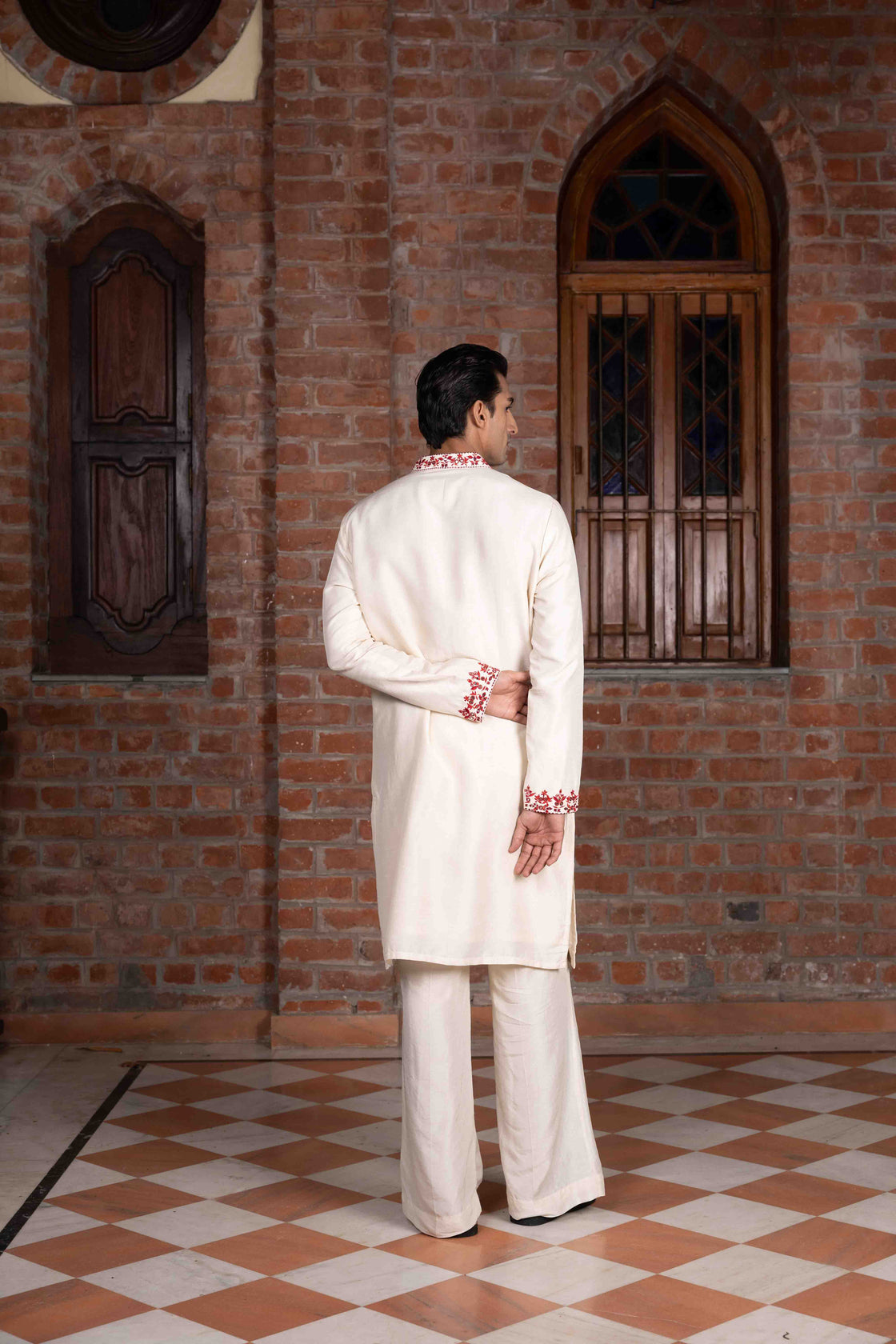 Ivory tussar silk kurta with rust thread and mirror work with ivory tussar silk flared pants Nafsstore