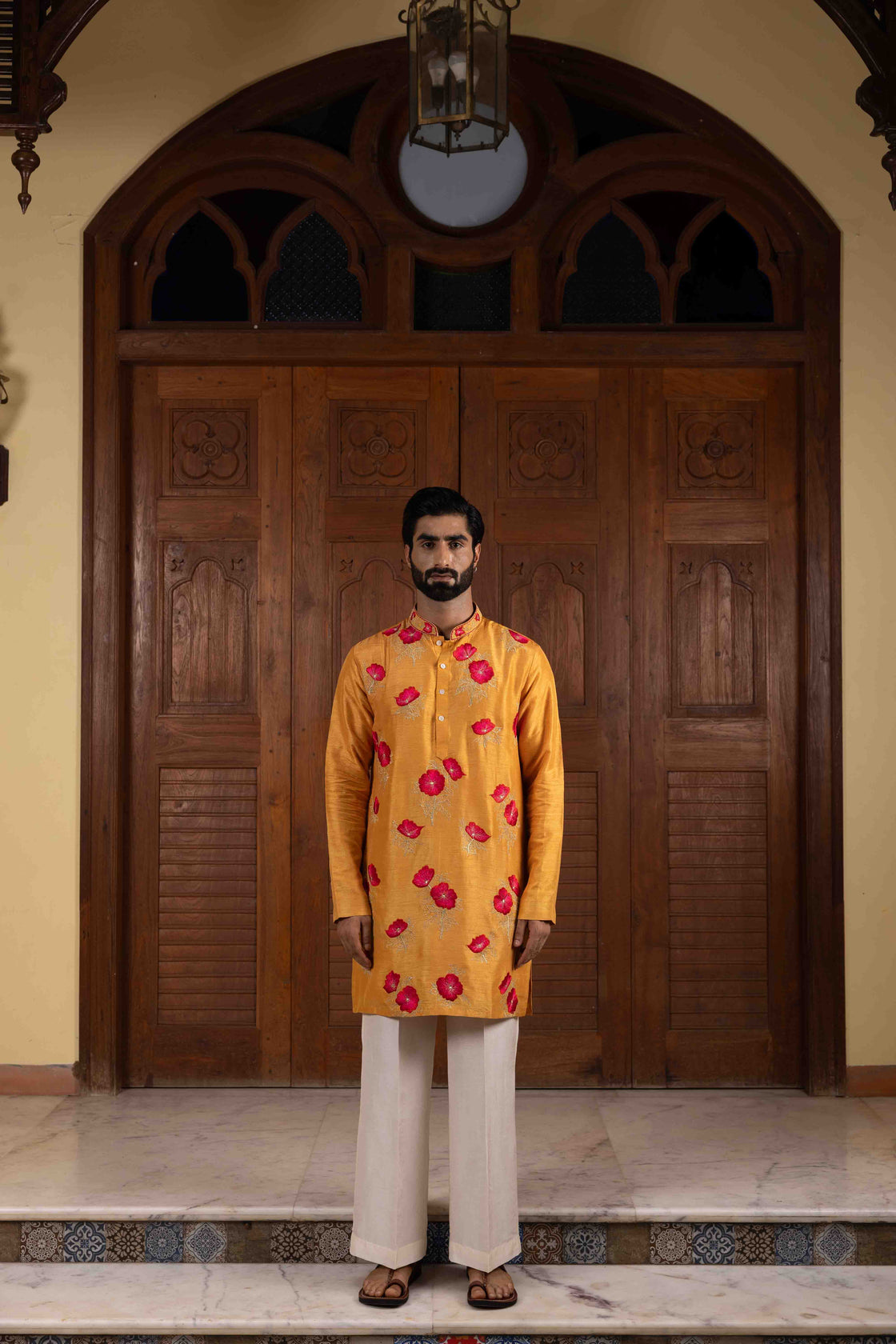 Fire yellow tussar silk kurta with floral thred with ombre red & pink kasab embroidery with ivory tussar flared pant Nafsstore
