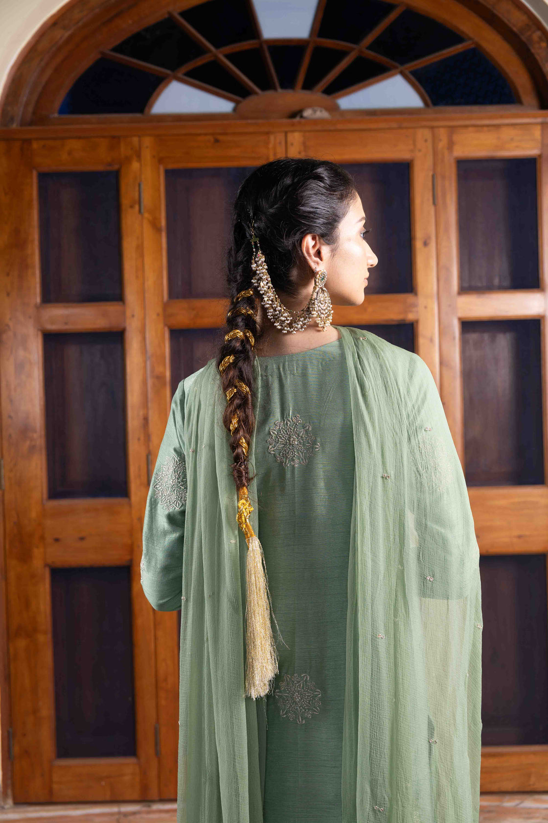 Moss green tussar silk polki buttoned resham, kasab and mirror work kurta paired with bemberg satin farshi salwar and chiffon scallop dupatta Nafsstore