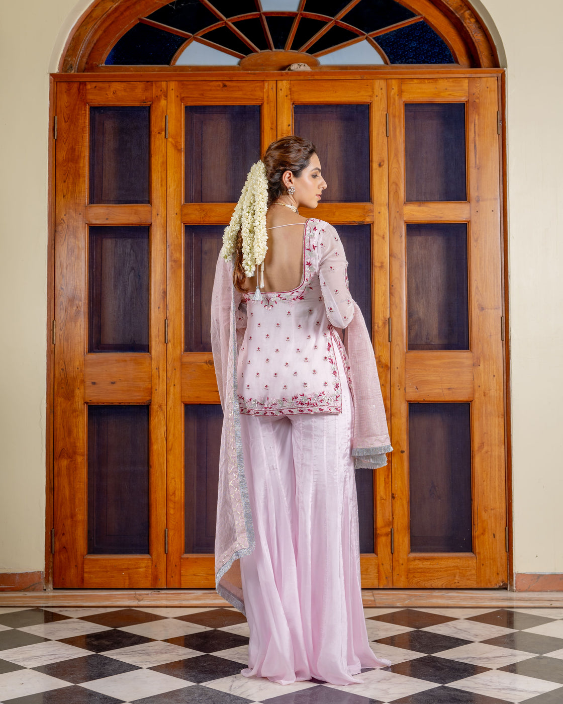 Powder pink georgette kurta with resham, zardozi embroidery paired with silk organza sharara and textured tissue sequin and kiran edges dupatta Nafsstore