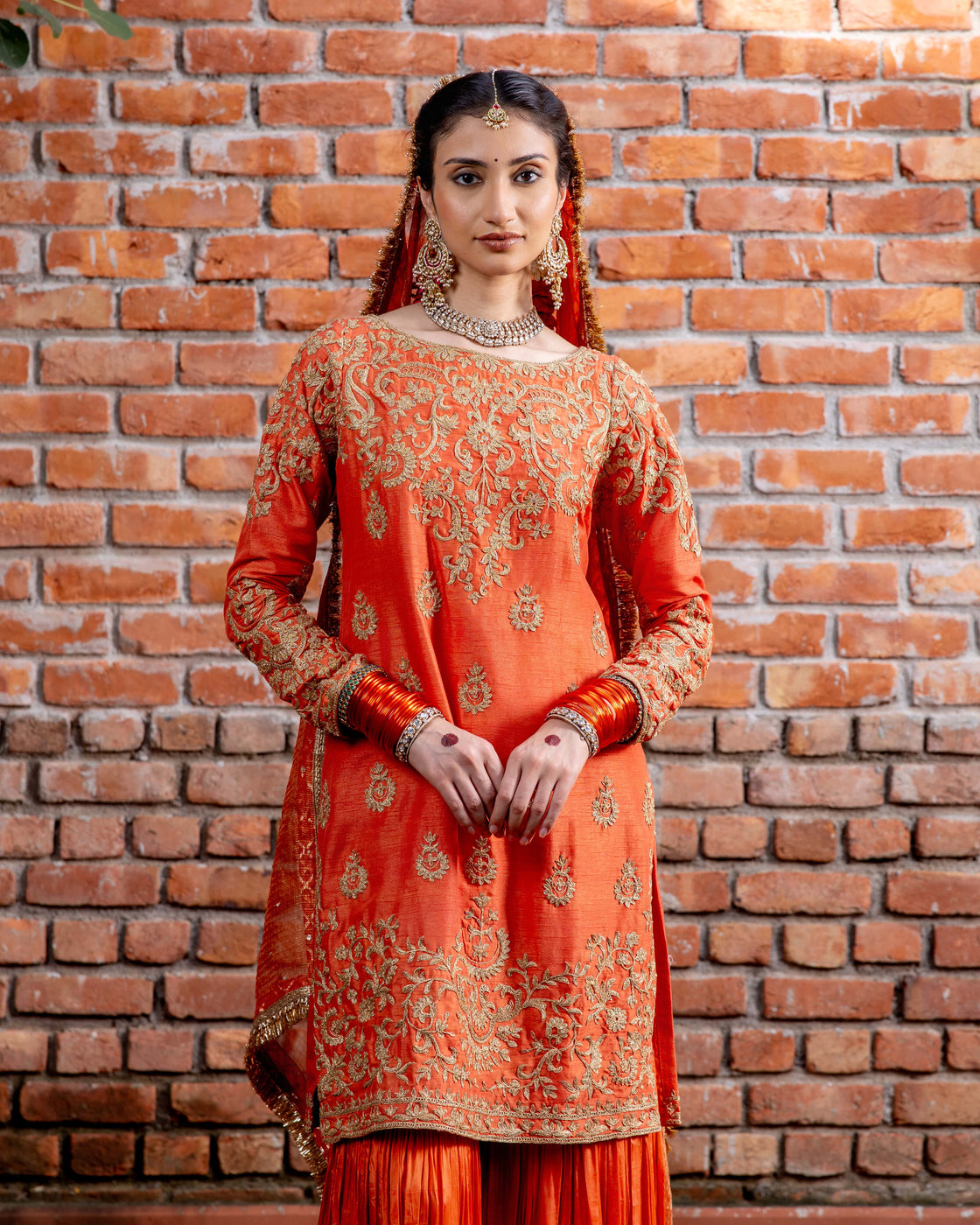 Rust tussar silk kurta with resham and kasab dori work paired with silk organza garara and textured tissue sequin and kiran edges dupatta Nafsstore