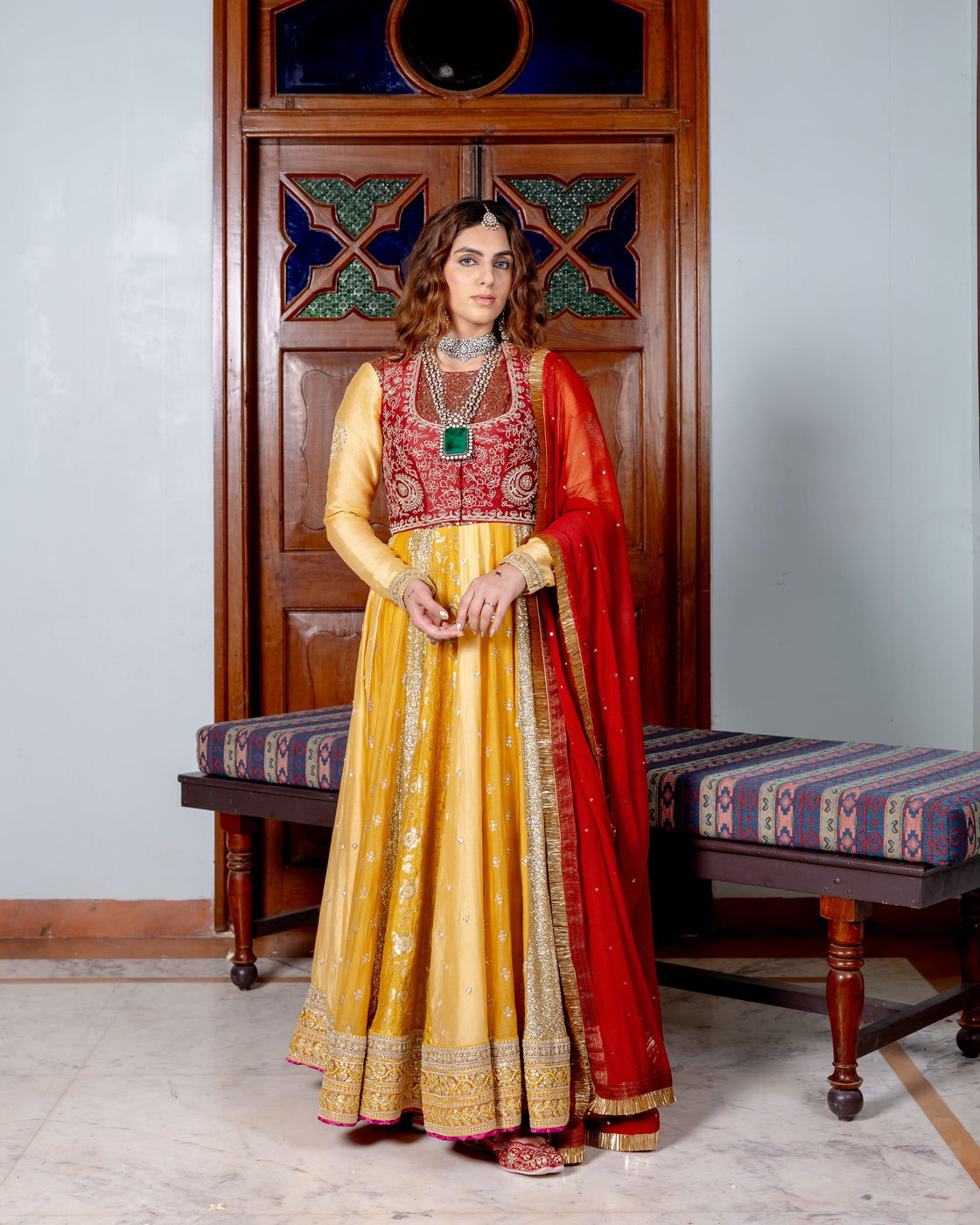 Canary yellow and dark rose Anarkali with brocade, sequin, heart zardozi motifs and sequin butti pannels paired with dark rose zardozi and kasab jaal work koti and chiffon badla work and kiran edges dupatta Nafsstore
