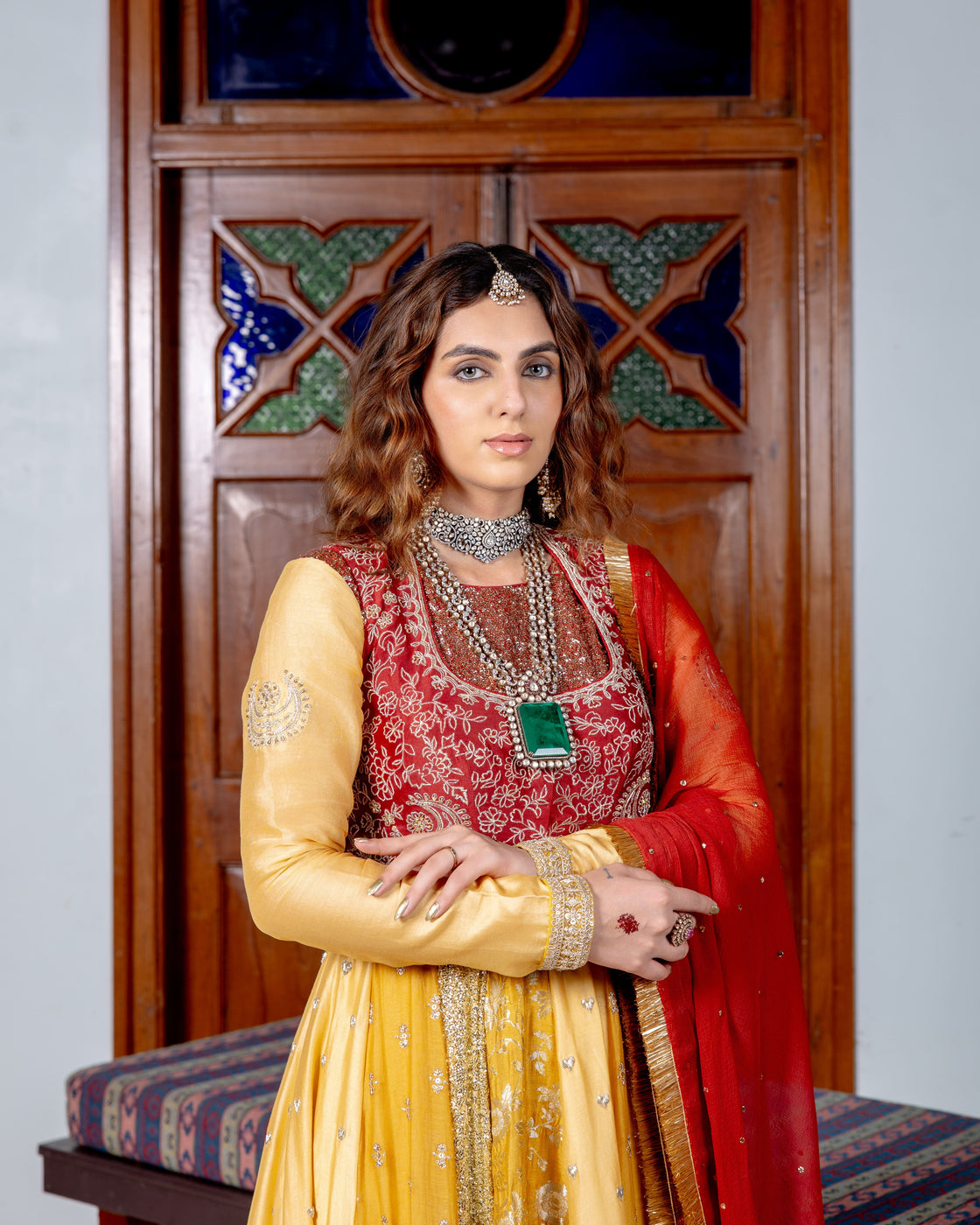 Canary yellow and dark rose Anarkali with brocade, sequin, heart zardozi motifs and sequin butti pannels paired with dark rose zardozi and kasab jaal work koti and chiffon badla work and kiran edges dupatta Nafsstore