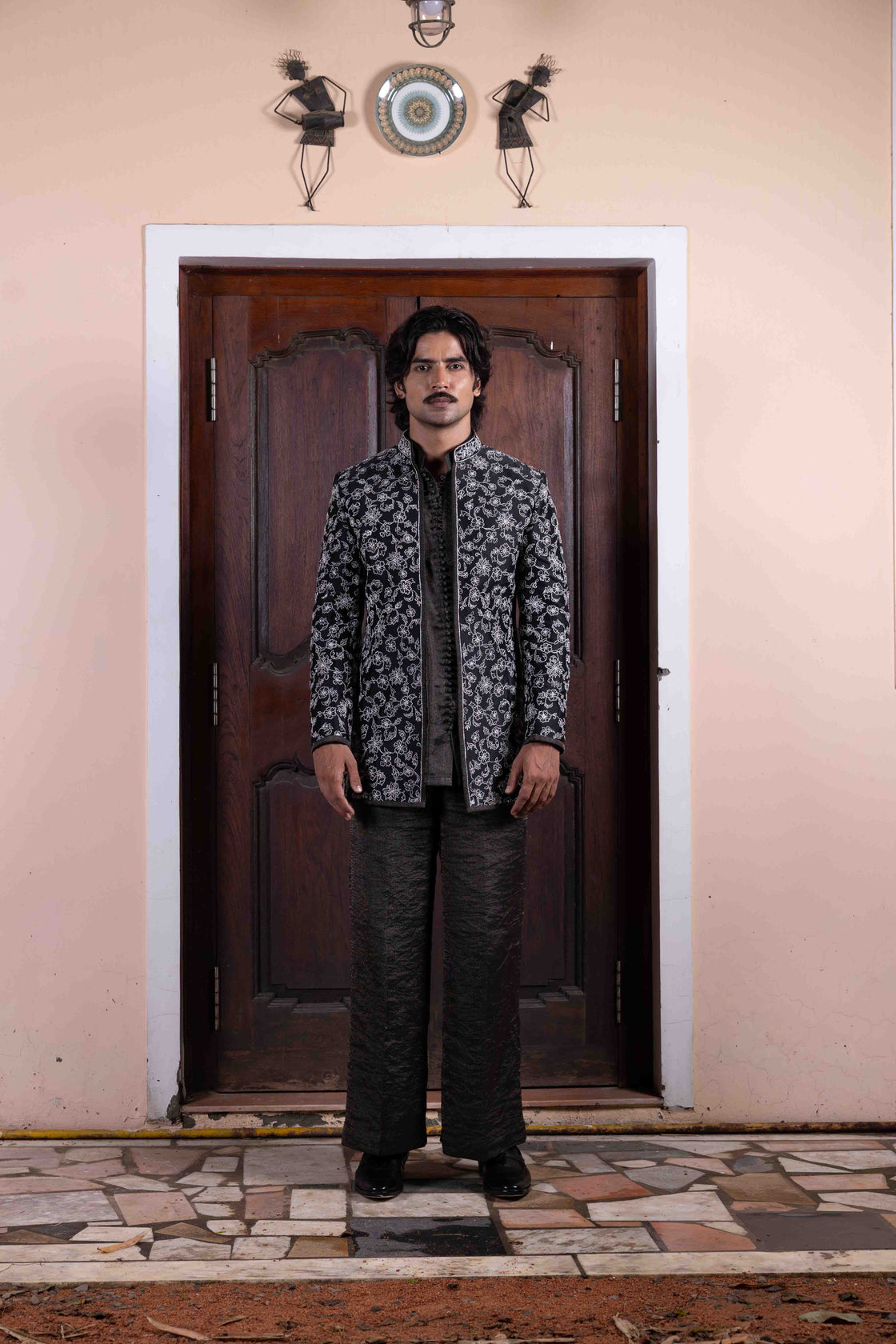 Jade tussar silk jacket with floral kasab and zardozi jaal work paired with textured tissue potli button shirt and flared pant Nafsstore
