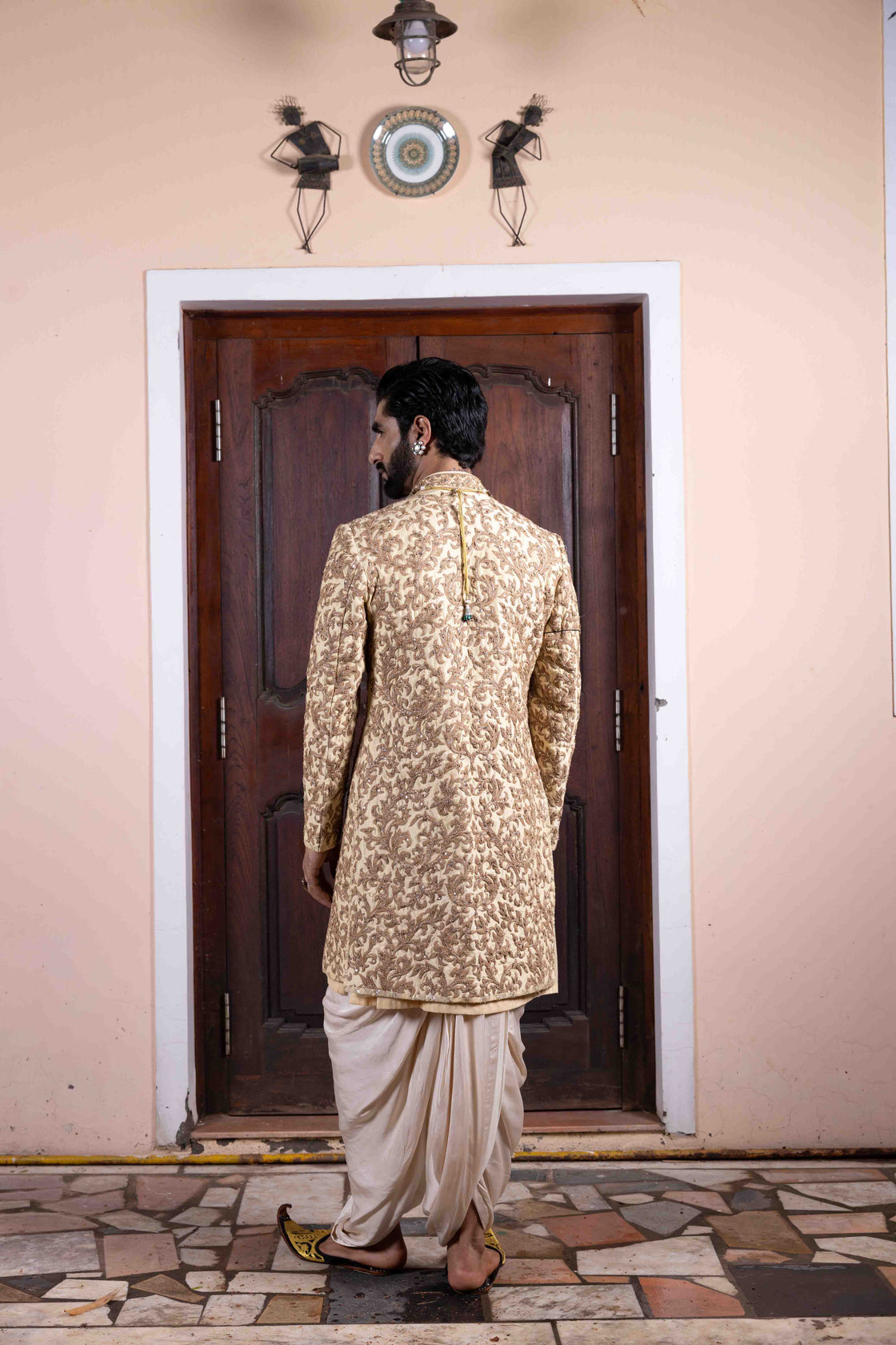 Pecan pie tussar silk sherwani with vine inspired dori and zardozi embroidery paired with ivory bemberg satin dhoti Nafsstore