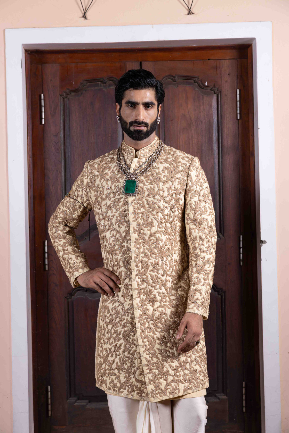 Pecan pie tussar silk sherwani with vine inspired dori and zardozi embroidery paired with ivory bemberg satin dhoti Nafsstore