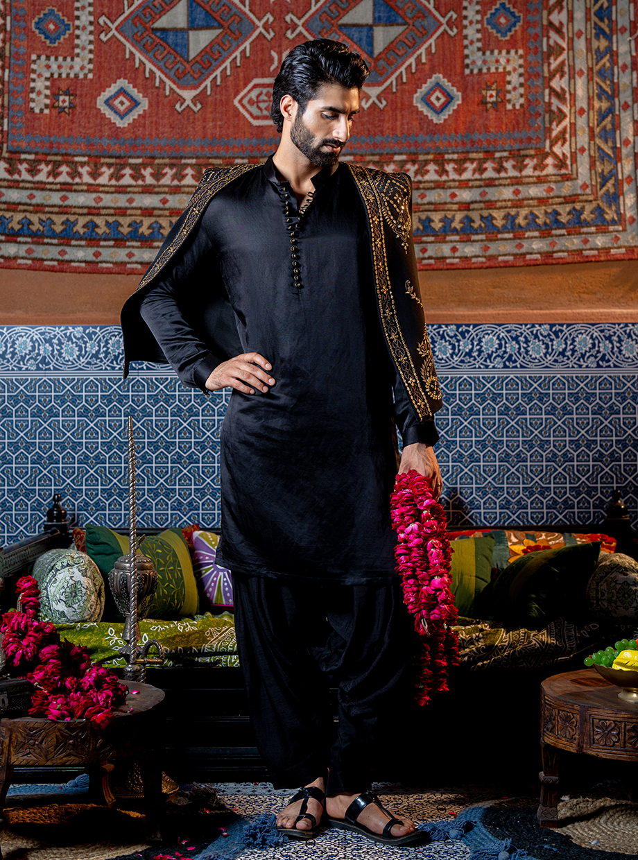 RAVEN BLACK TUSSAR SILK PATHANI SET PAIRED WITH LACHKA KOTI EXAGGERATED WITH KASAB GOLD MIRROR WORK Nafsstore