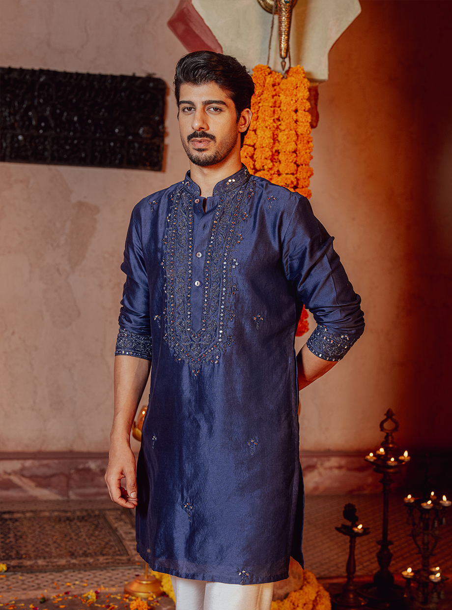 INDIGO BLUE KURTA EXAGGERATED WITH RESHAM, KASAB, DORI & MIRROR WORK PAIRED WITH IVORY CHANDERI PANT Nafsstore