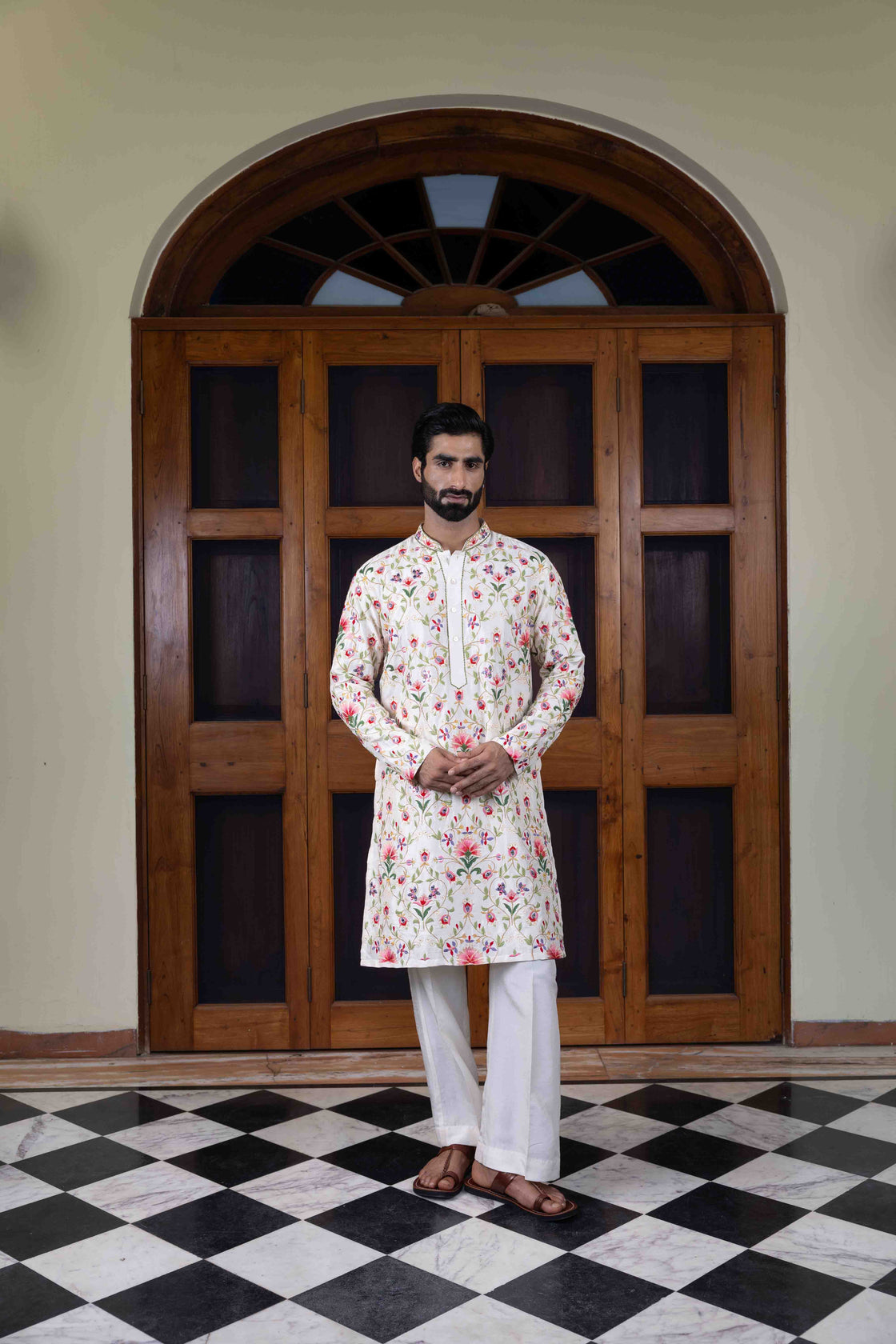 Ivory tussar silk kurta with multi-hued floral jaal resham and mirror work kurta with ivory tussar silk flared pant Nafsstore