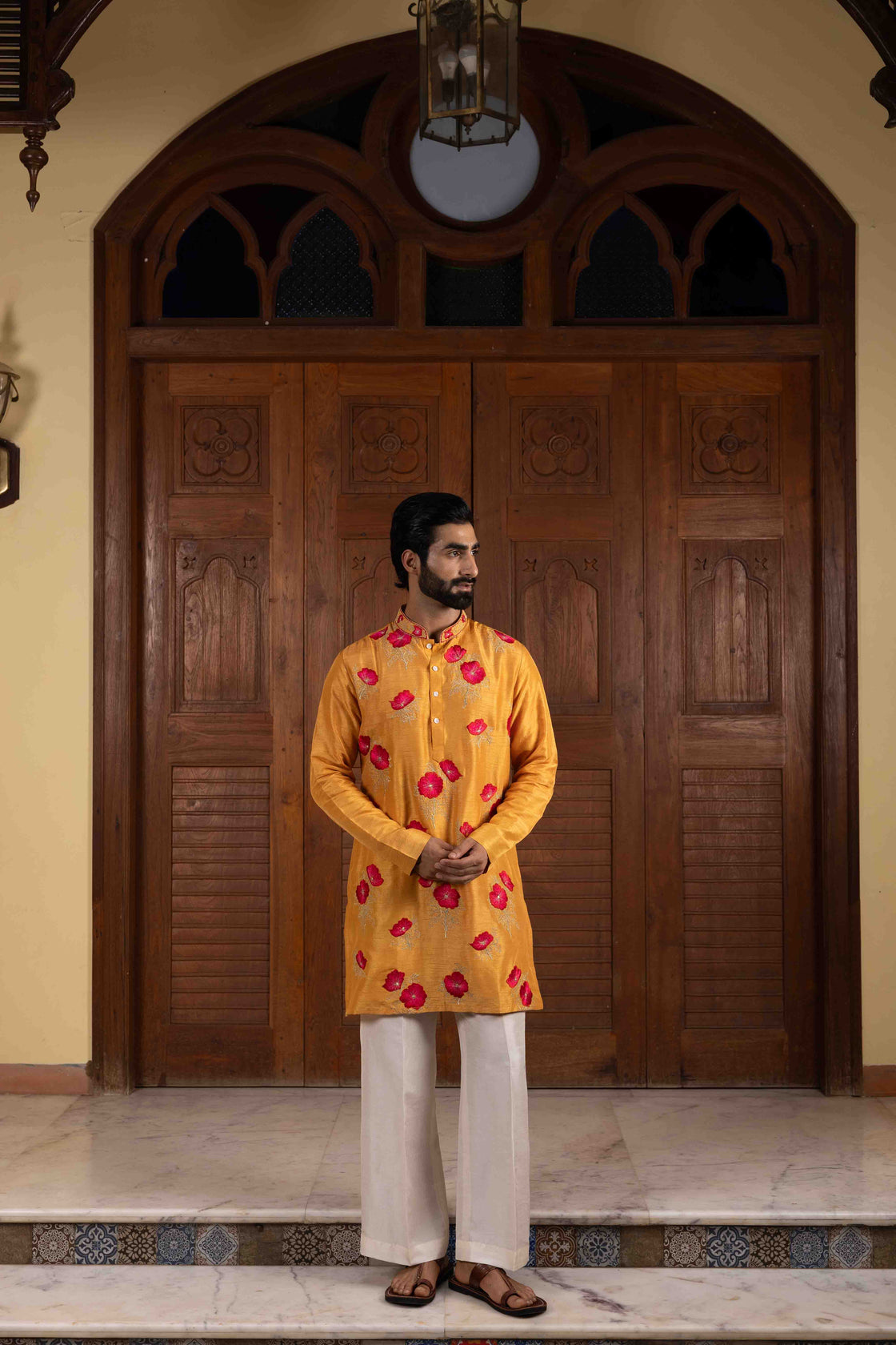 Fire yellow tussar silk kurta with floral thred with ombre red & pink kasab embroidery with ivory tussar flared pant Nafsstore