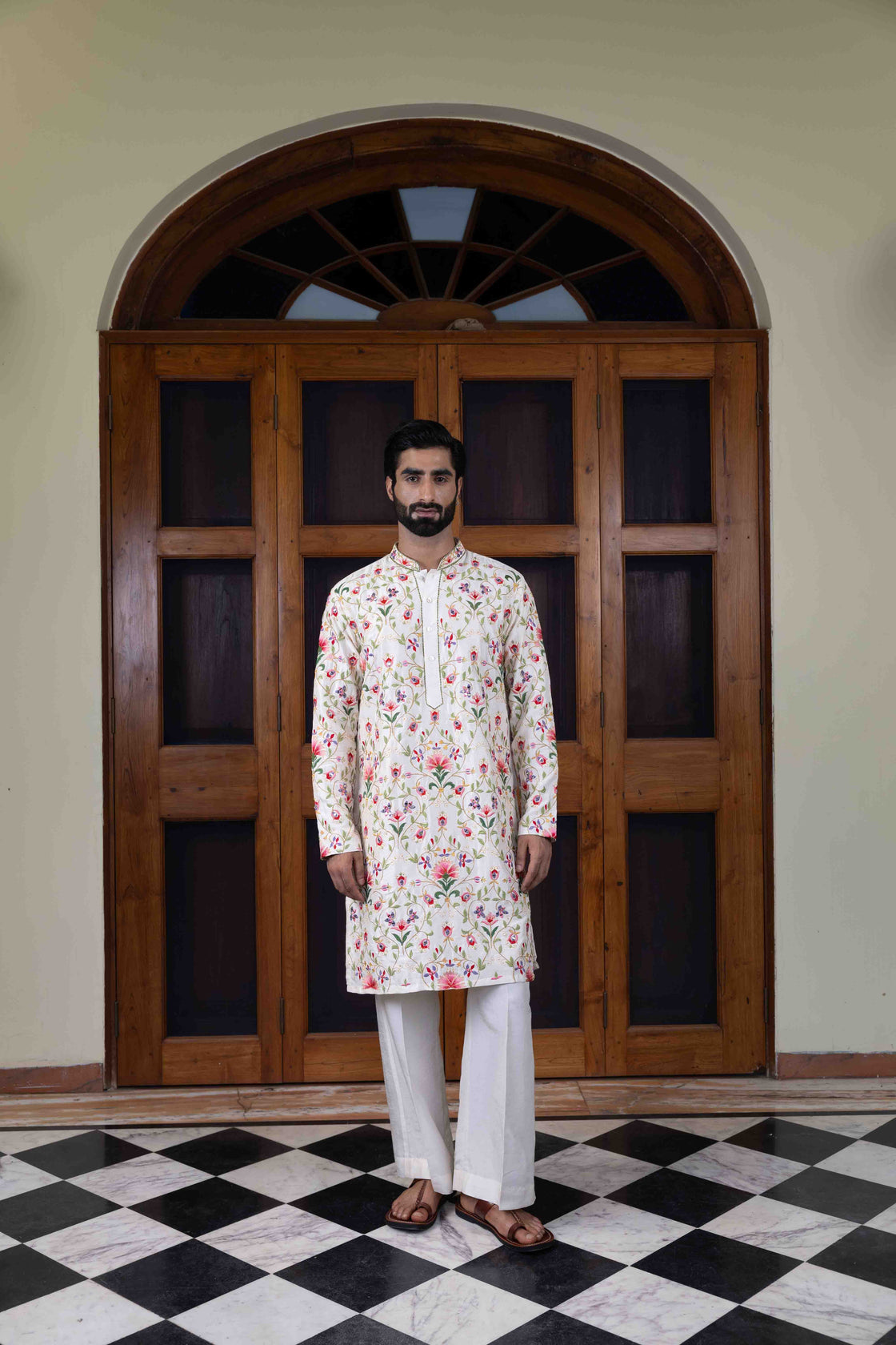 Ivory tussar silk kurta with multi-hued floral jaal resham and mirror work kurta with ivory tussar silk flared pant Nafsstore