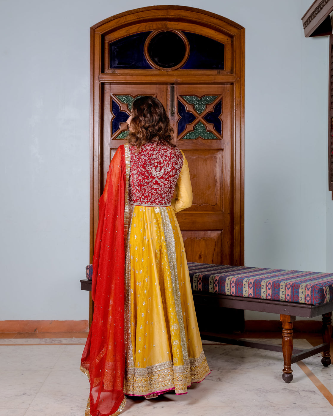 Canary yellow and dark rose Anarkali with brocade, sequin, heart zardozi motifs and sequin butti pannels paired with dark rose zardozi and kasab jaal work koti and chiffon badla work and kiran edges dupatta Nafsstore
