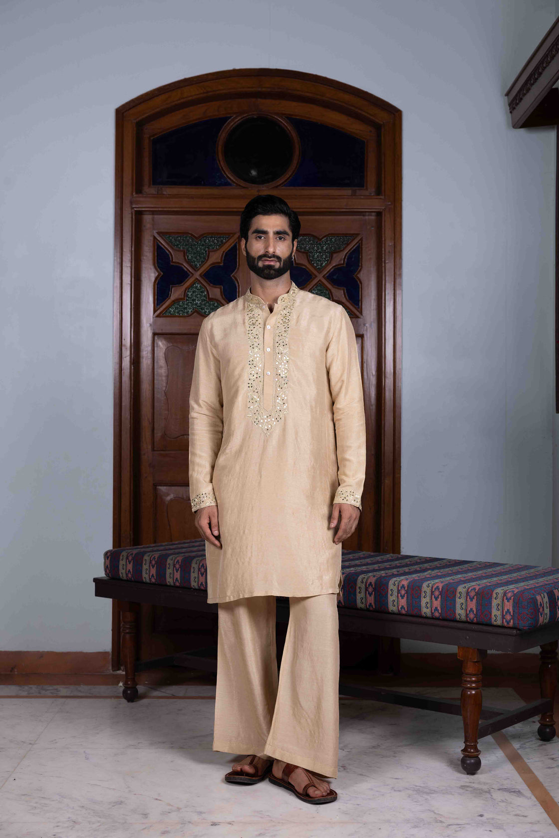 Sand tussar silk kurta with gold kasab and mirror work paired with sand tussar silk flared pant Nafsstore