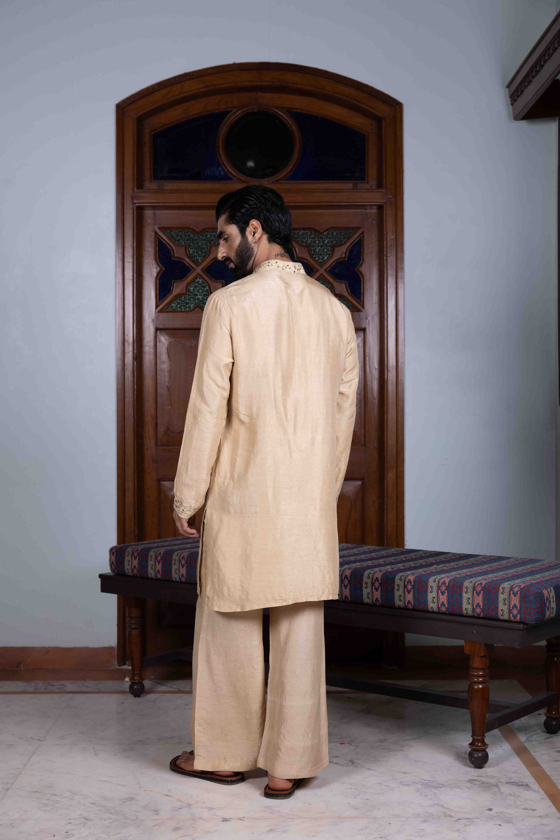 Sand tussar silk kurta with gold kasab and mirror work paired with sand tussar silk flared pant Nafsstore
